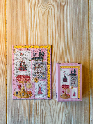Couture Chronicle minipuslespil med 99 brikker fra Penny Puzzle