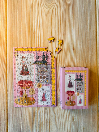Couture Chronicle minipuslespil med 99 brikker fra Penny Puzzle