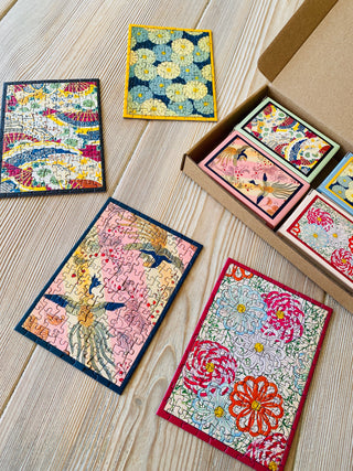 4 x Japansk minipuslespil med 99 brikker fra Penny Puzzle